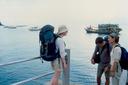 Ashe talking with some friends we made on the docks waiting for our ferry to Tioman Island.